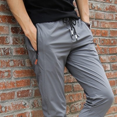 Sports pants, men's summer pants, thin casual pants, slim feet, quick drying, breathable slacks, men, Xia Kuzi
