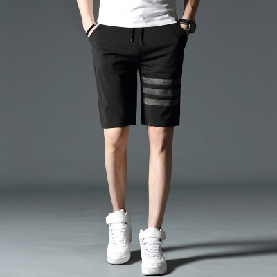 The summer male sports shorts in summer five stamp breeches loose beach big pants pants men's summer tide