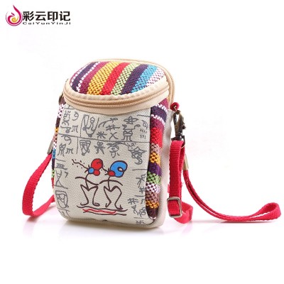 Cartoon Dongba zero wallet fabric mobile phone bag, cute female hand bag, mini canvas bag, multi-function