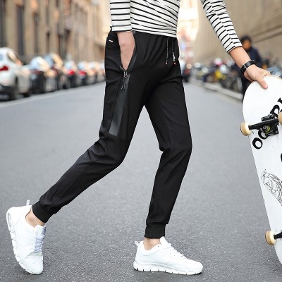 Pánské kalhoty léto nový příliv Korejský příležitostný kalhoty Harlan devět kalhot sportovní tenký úsek Slim kalhoty