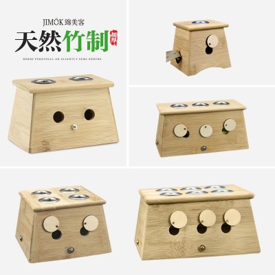 Moxibustion-boksen er laget av tre og bambus med et enkelt hull og dobbelt hull fumigata